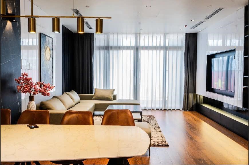 
Phòng khách trong thiết kế căn hộ 100m2 3 phòng ngủ